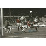 Lou Macari and Jimmy Greenhoff signed 12 x 8 inch colourized Man Utd Football action photo. Good