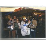 Black Eyed Peas signed 12x8 colour photo. Good condition. All autographs come with a Certificate