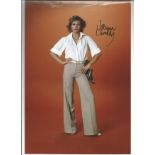 Joanna Lumley signed 12 x 8 inch colour full length photo. Good condition. All autographs come