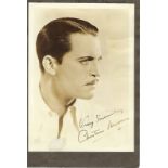 Chester Morris Signed 7 x 5 inch sepia photo mounted to card, slight fading. Condition 6/10. Good