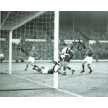 Football John Connelly signed 10x8 black and white signed photo pictured in action for England. John