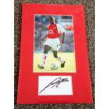 Football Lauren signed and mounted display. A white card signed by Ex Arsenal star Lauren