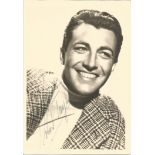 Robert Taylor signed 7x5 vintage black and white photo. Good Condition. All autographs are