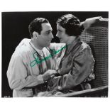 Irene Dunne Signed 10 x 8 inch vintage b/w photo from Symphony of Six Million with Ricardo Cortez.