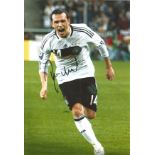 Football Piotr Trochowski 12x8 signed colour photo pictured in action for Germany. Good Condition.