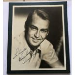 Alan Ladd signed vintage sepia 10 x 8 photo fixed to green mount, dedicated. Mount on back has