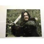 Game of Thrones Kit Harrington signed 10 x 8 inch colour photo, sword in hand. Good condition. All