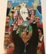 Alex Ferguson signed 12 x 8 inch colour photo celebrating with Premiership Trophy. Good condition.
