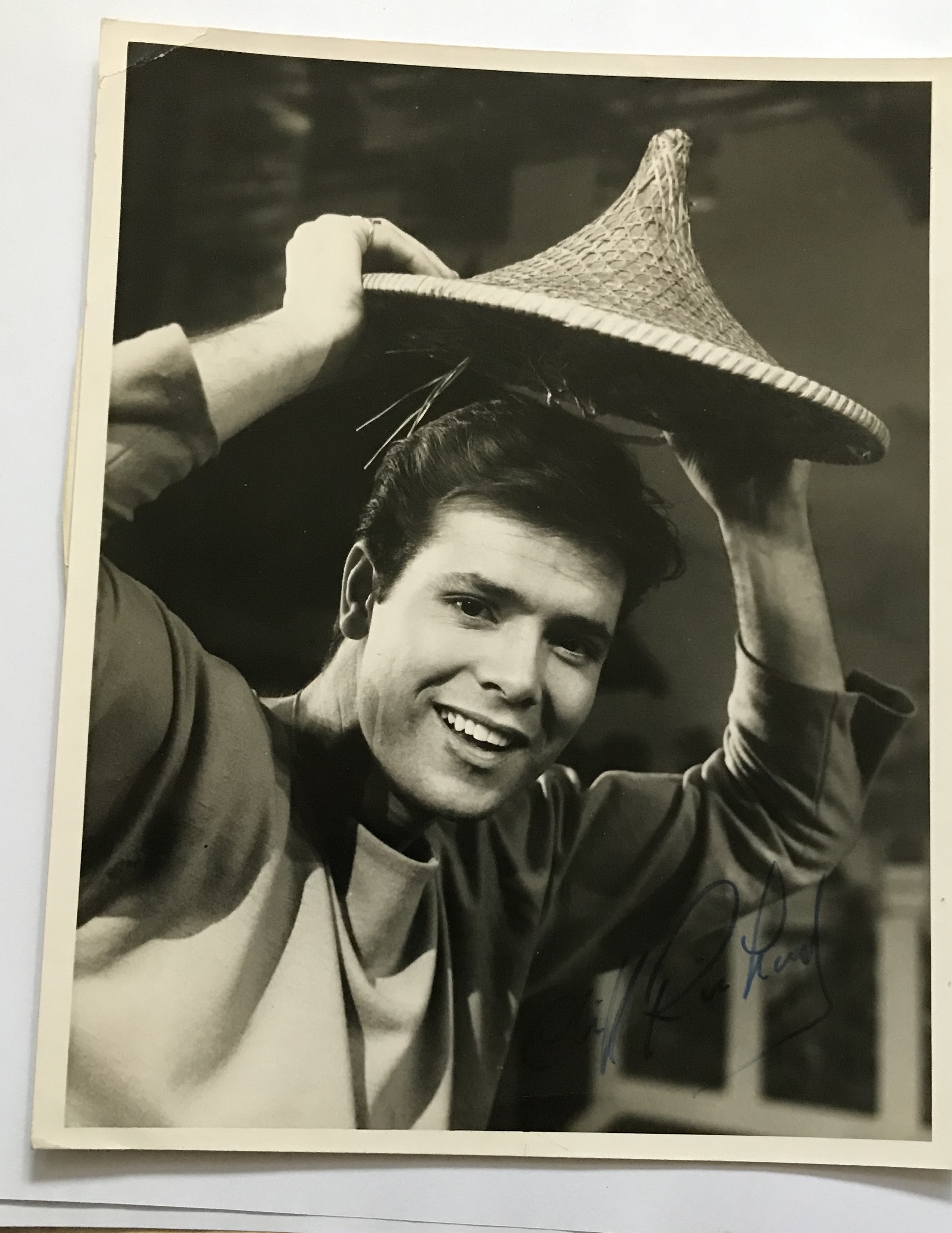 Cliff Richard signed vintage 10 x 8 inch b/w still photo from Aladdin. Few dings condition 7/10.