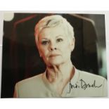 James Bond Judi Dench signed 10 x 8 inch colour photo as M. Good condition. All signed pieces come