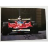 Motor Racing Jody Scheckter signed 12 x 8 inch colour action photo. Good condition. All signed