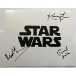 Star Wars 10 x 8 inch b/w photo signed by Michael Henbury, Richard Stride and Kamay Lau. Good