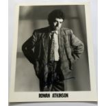 Rowan Atkinson signed 10 x 8 inch b/w Not the Nine O'clock News era photo rare autograph. Good