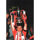 Bryan Robson signed 16x12 colour photo. Good Condition. All autographs come with a Certificate of