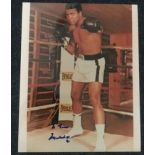 Muhammad Ali signed 10 x 8 inch colour photo in the ring, dedicated. Condition 8/10. Good Condition.