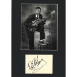 BB King signature piece mounted below black and white photo. Approx overall size 16x12. Good