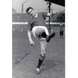 Autographed Bill Foulkes 12 X 8 Photo - B/W, Depicting The Man United Centre-Half Striking A