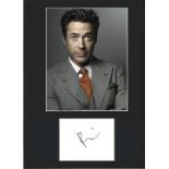 Robert Downey Jr signature piece mounted below colour photo. Approx overall size 16x12. Good