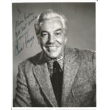 Cesar Romero signed and dedicated 10 x 8 inch b/w photo. Good Condition. All autographs come with