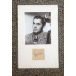 Tyrone Power signature piece mounted below black and white photo. (May 5, 1914 - November 15,