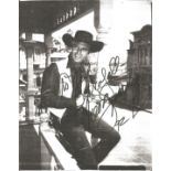 George Montgomery signed 10x8 black and white magazine photo. George Montgomery, born George