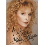 Stella Stevens signed 7 x 5 inch colour photo to Neil. Good Condition. All autographs come with a