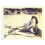 Ann Rutherford signed 12 x 8 inch copy of sepia photo. Good Condition. All autographs come with a