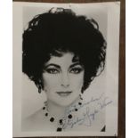 Elizabeth Taylor Warner signed 10 x 8 inch b/w photo, slight tear to top middle and some paper