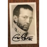 Eric Clapton signed 6 x 4 inch b/w photo. Good Condition. All autographs come with a Certificate