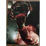 Ian Brown Stone Roses music signed 16 x 12 inch colour photo on stage. Good Condition. All