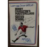 Bobby Charlton two signed programmes. Olympic Packaging and Soccer Master Class. Good Condition. All