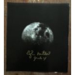 Apollo 14 astronaut Dr Ed Mitchell signed 10 x 10 inch colour space book photo of the moon. Good