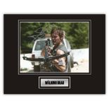 Stunning Display! The Walking Dead Norman Reedus hand signed professionally mounted display. This