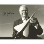 Concorde captain Jock Lowe signed 10 x 8 inch b/w photo of him holding a model of the iconic