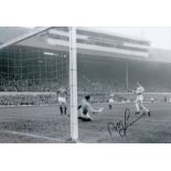 Autographed Bobby Lennox 12 X 8 Photo B/W, Depicting Lennox Shooting Past Rangers Goalkeeper