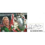 Peter Schmeichel Signed Page With Manchester United Photo. Good condition. All autographs come