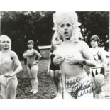 Barbara Windsor signed 10 x 8 b/w cheeky photo from Carry on Camping. Good condition. All autographs