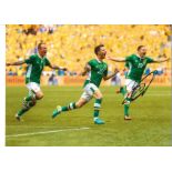 Robbie Brady Ireland Signed 16 x 12 inch football photo. Good condition. All autographs come with