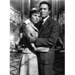 Christopher Plummer signed 16 x 12 inch b/w photo of poster hugging Julie Andrews. Good condition.