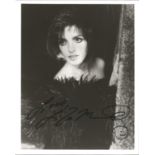 Liza Minelli signed 10 x 8 inch b/w early portrait photo, signed to slightly darker area. Good
