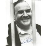 Ronnie Barker signed 10 x 8 inch b/w from Porridge. Good condition. All autographs come with a