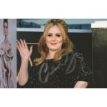Adele signed 6x4 colour photo. Good condition. All autographs come with a Certificate of