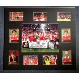 Manchester United 1999 Champions autograph display.