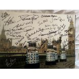 Doctor Who 14x11 inch photo signed by 40 actors and actresses