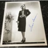 Irene Dunne signed 10 x 8 inch b/w photo. Condition 8/10. All autographs come with a Certificate