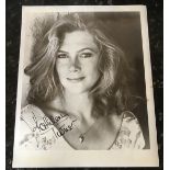 Kathleen Turner signed 10 x 8 inch b/w photo; info card fixed to reverse. Condition 6/10. All