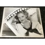 Bette Davis young signed 10 x 8 inch b/w photo. Condition 8/10. All autographs come with a