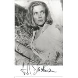 Honor Blackman signed 6x4 black and white photo pictured in her role as Pussy Galore in the Bond