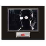 Stunning Display! Sin City Elijah Wood hand signed professionally mounted display. This beautiful