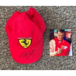 Motor Racing, Michael Schumacher signed Ferrari cap complete with provenance photo. Good